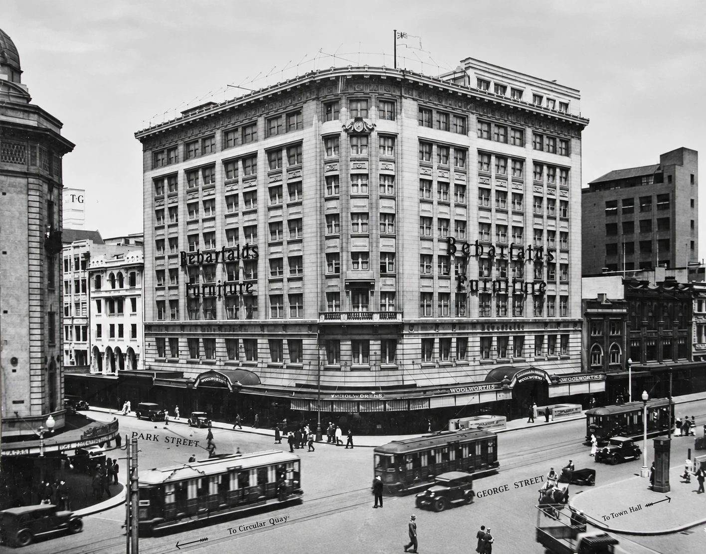 Archival streetscape of Bebarfalds Corner and Woolworths, George and Park Streets, Sydney, circa 1930